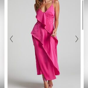 Midi hot pink dress with adjustable straps.